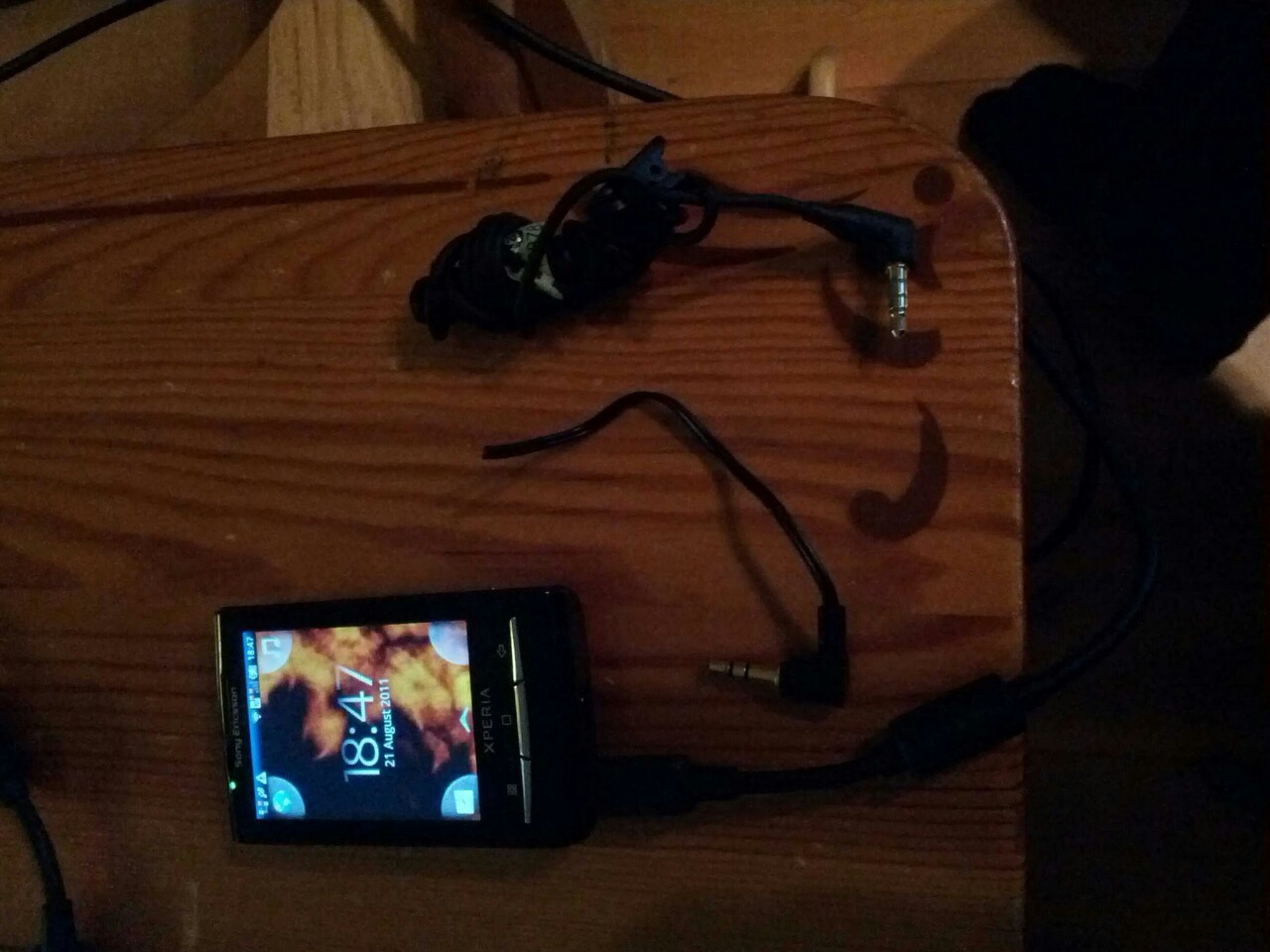 Mobile ActDresses concept prototype: phone accessory that triggers download of a specific app
